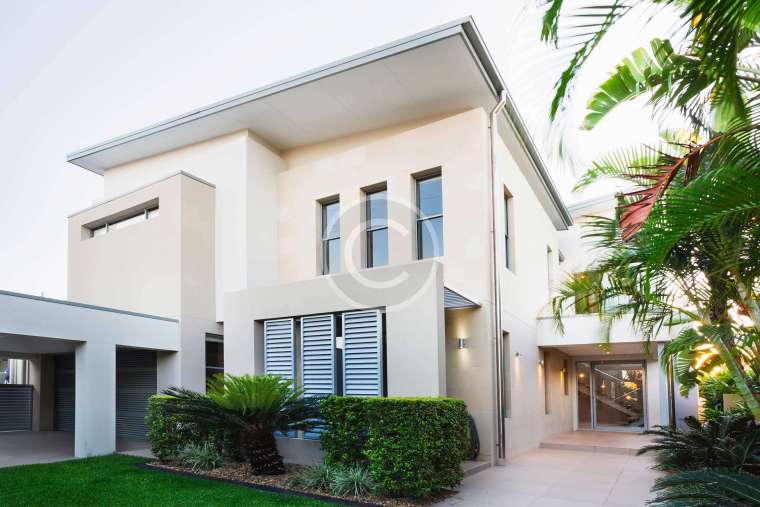 A House with a Massive, Undulating, Wave-Like Exterior